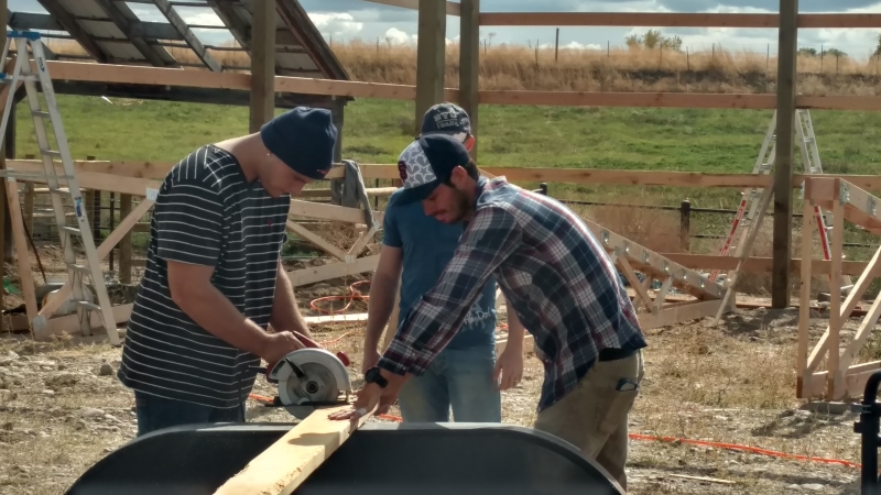 Mentors and Students building a new hay barn and tack room on Kingfisher Ranch property
